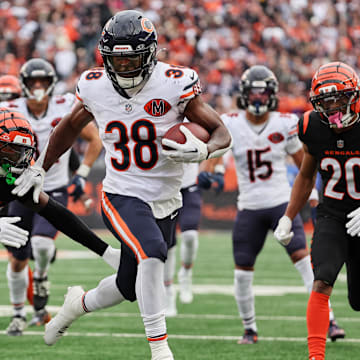 Nov 2, 2025; Cincinnati, Ohio, USA; Chicago Bears running back Brittain Brown (38) runs for a touchdown against Cincinnati Bengals safety Jordan Battle (27) and cornerback DJ Turner II (20) during the third quarter at Paycor Stadium. Mandatory Credit: Joseph Maiorana-Imagn Images