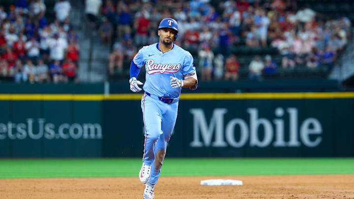 Jun 9, 2024; Arlington, Texas, USA; Texas Rangers second base Marcus Semien (2) rounds the bases after hitting a home run during the second inning against the San Francisco Giants at Globe Life Field. Mandatory Credit: Kevin Jairaj-USA TODAY Sports