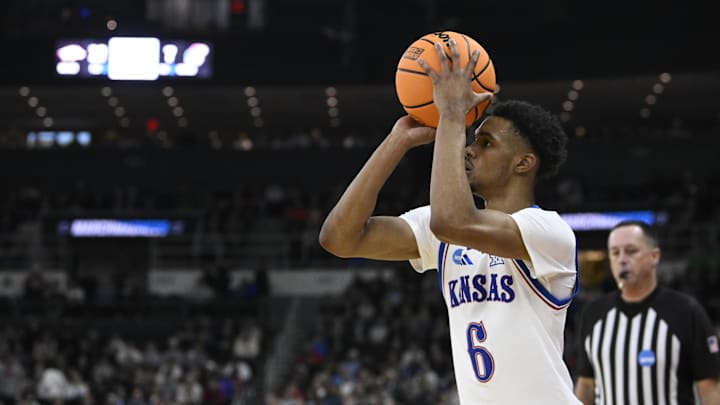 Mar 20, 2025; Providence, RI, USA;  Kansas Jayhawks guard Rylan Griffen (6) shoots the ball during the first quarter against the Arkansas Razorbacks at Amica Mutual Pavilion. Mandatory Credit: Eric Canha-Imagn Images