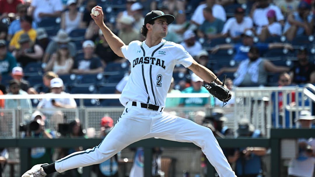 Jun 13, 2025; Omaha, Neb, USA; Coastal Carolina Chanticleers pitcher Cameron Flukey (2) throws against the Arizona Wildcats during the ninth inning at Charles Schwab Field. 