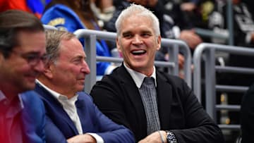Feb 22, 2025; Los Angeles, California, USA; Los Angeles Kings executive Luc Robitaille with commissioner Gary Bettman during the first period at Crypto.com Arena. Mandatory Credit: Gary A. Vasquez-Imagn Images