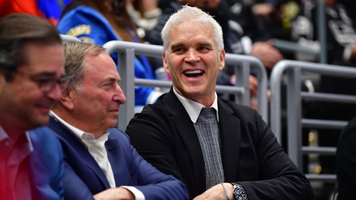 Feb 22, 2025; Los Angeles, California, USA; Los Angeles Kings executive Luc Robitaille with commissioner Gary Bettman during the first period at Crypto.com Arena. Mandatory Credit: Gary A. Vasquez-Imagn Images
