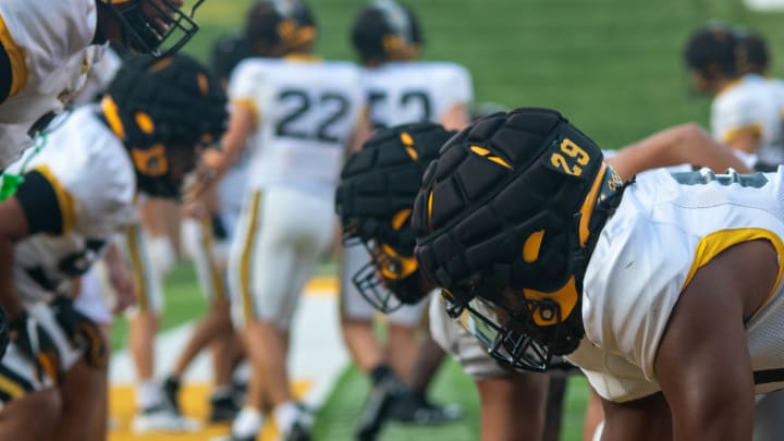 Aug 17, 2024; Columbia, Missouri, USA; Offensive and defensive linemen warm up at the Missouri Tigers annual fan night practice at Faurot Field at Memorial Stadium. 