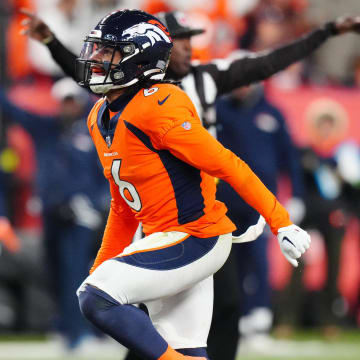 Nov 26, 2023; Denver, Colorado, USA; Denver Broncos safety P.J. Locke (6) celebrates his sack against the Cleveland Browns in the fourth quarter at Empower Field at Mile High. Mandatory Credit: Ron Chenoy-USA TODAY Sports