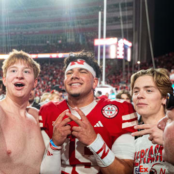 Nov 23, 2024; Lincoln, Nebraska, USA; Nebraska Cornhuskers quarterback Dylan Raiola (15) takes a picture with fans after defeating the Wisconsin Badgers at Memorial Stadium. 