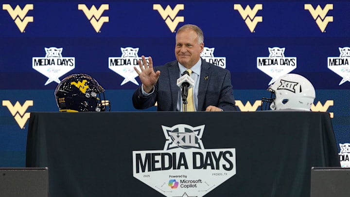 West Virginia head coach Rich Rodriguez speaks with the media during 2025 Big 12 Football Media Days at The Star. West Virginia head coach Rich Rodriguez speaks with the media during 2025 Big 12 Football Media Days at The Star.