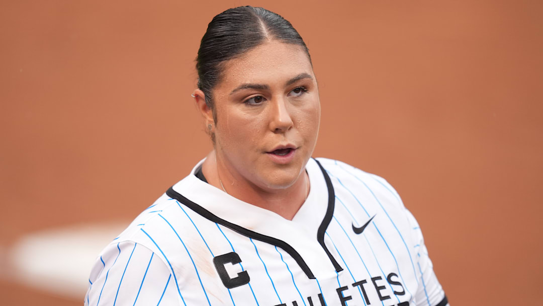 Bandits pitcher Taylor McQuillin plays the role of the eponymous team captain during an Athletes Unlimited Pro (now known as the All-Star Cup) game against Team Kilfoyl at Max R. Joyner Family Stadium on August 7, 2024 in Greenville, N.C.