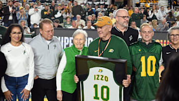 Michigan State men's basketball coach Tom Izzo returned to the Upper Peninsula and Northern Michigan University for the Spartans' exhibition 2024-25 season opener against NMU. Izzo, a 1977 NMU graduate, was also honored with his jersey No. 10 retired during the game.
