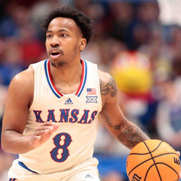 Kansas Jayhawks guard David Coit (8) looks for an open pass against Arizona State Sun Devils in the second half of the game inside Allen Fieldhouse Wednesday, Jan. 8, 2025.