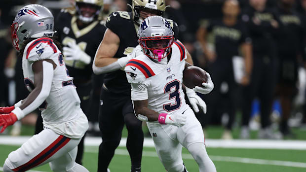 New England Patriots wide receiver Demario Douglas (3) runs for a gain.