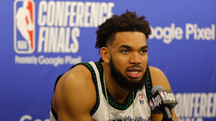 May 22, 2024; Minneapolis, Minnesota, USA; Minnesota Timberwolves center Karl-Anthony Towns (32) speaks in a press conference after game one against the Dallas Mavericks in the western conference finals for the 2024 NBA playoffs at Target Center. Mandatory Credit: Bruce Kluckhohn-Imagn Images