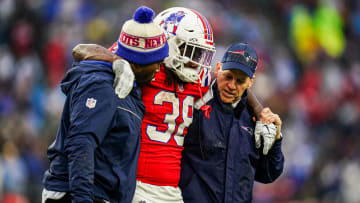 Dec 3, 2023; Foxborough, Massachusetts, USA; New England Patriots running back Rhamondre Stevenson (38) is helped off the field as they take on the Los Angeles Chargers in the second quarter at Gillette Stadium. Mandatory Credit: David Butler II-USA TODAY Sports