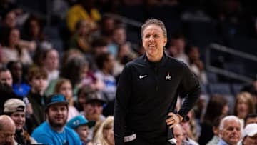 Mar 1, 2025; Charlotte, North Carolina, USA; Washington Wizards head coach Brian Keefe looks on during the second quarter against the Charlotte Hornets at Spectrum Center. Mandatory Credit: Scott Kinser-Imagn Images