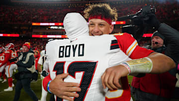 Jan 18, 2025; Kansas City, Missouri, USA; Kansas City Chiefs quarterback Patrick Mahomes (15) meets with Houston Texans cornerback Kris Boyd (17) after a 2025 AFC divisional round game at GEHA Field at Arrowhead Stadium. Mandatory Credit: Denny Medley-Imagn Images