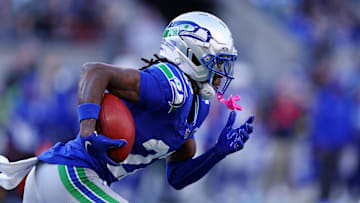 Nov 30, 2025; Seattle, Washington, USA; Seattle Seahawks wide receiver Rashid Shaheed (22) runs the ball during the second half against the Minnesota Vikings at Lumen Field. Mandatory Credit: Kevin Ng-Imagn Images