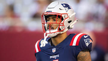 Dec 15, 2024; Glendale, Arizona, USA; New England Patriots wide receiver Ja'Lynn Polk (1) against the Arizona Cardinals at State Farm Stadium. Mandatory Credit: Mark J. Rebilas-Imagn Images