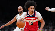 Nov 5, 2025; Boston, Massachusetts, USA; Washington Wizards forward Kyshawn George (18) returns the ball against the Boston Celtics in the first quarter at TD Garden. Mandatory Credit: David Butler II-Imagn Images
