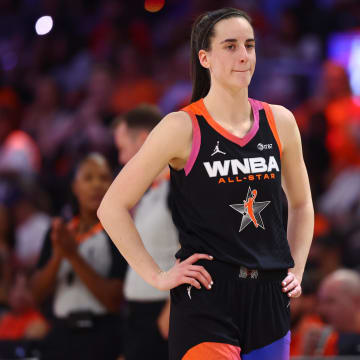 Jul 20, 2024; Phoenix, AZ, USA; Team WNBA guard Caitlin Clark (22) against the USA Women's National Team during the 2024 WNBA All Star Game at Footprint Center.