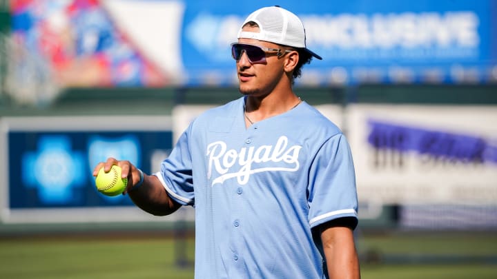 Chiefs quarterback Patrick Mahomes warms up on field at the annual Big Slick celebrity softball game prior to a game between the Kansas City Royals and Colorado Rockies at Kauffman Stadium. 