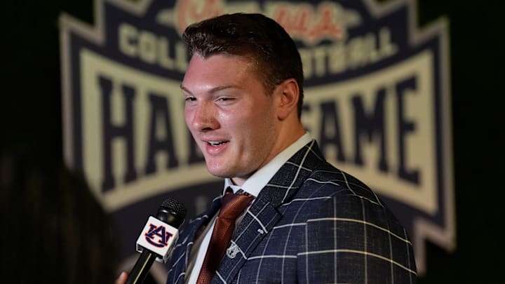 July 15, 2025; Atlanta, GA, USA; Auburn’s Connor Lew is interviewed during SEC Media Days at the College Football Hall of Fame in Atlanta.