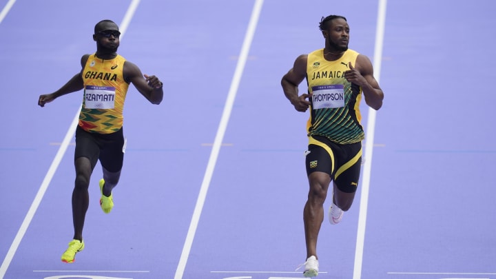 Aug 3, 2024; Paris, FRANCE; Kishane Thompson (JAM) in a men's 100m round 1 heat during the Paris 2024 Olympic Summer Games at Stade de France. Mandatory Credit: Andrew Nelles-USA TODAY Sports