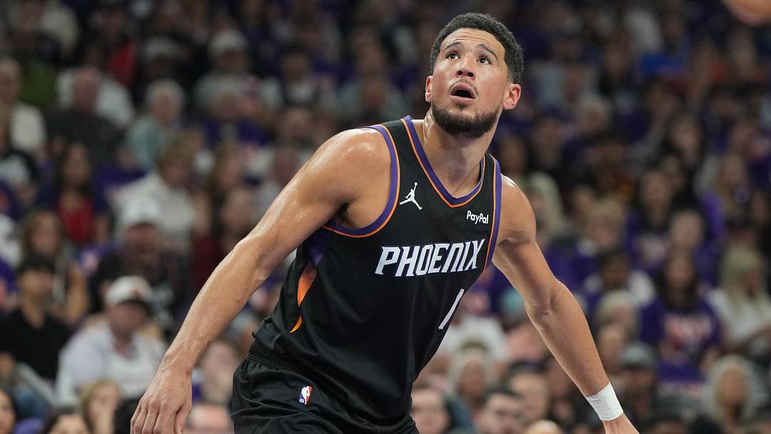 Apr 25, 2026; Phoenix, Arizona, USA; Phoenix Suns guard Devin Booker (1) blocks out against the Oklahoma City Thunder in the first half during game three of the first round of the 2026 NBA Playoffs at Mortgage Matchup Center. Mandatory Credit: Rick Scuteri-Imagn Images