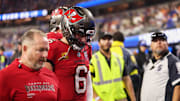 Nov 23, 2025; Inglewood, California, USA; Tampa Bay Buccaneers quarterback Baker Mayfield (6) walks off the field at halftime with an apparent injury against the Los Angeles Rams at SoFi Stadium. Mandatory Credit: Kiyoshi Mio-Imagn Images