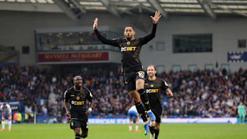 Matheus Cunha celebrates his late equaliser against Brighton 