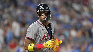 Jul 28, 2025; Kansas City, Missouri, USA;  Atlanta Braves right fielder Ronald Acuna Jr. (13) looks toward the Kansas City Royals dugout after getting walked in the ninth inning at Kauffman Stadium. Mandatory Credit: Peter Aiken-Imagn Images