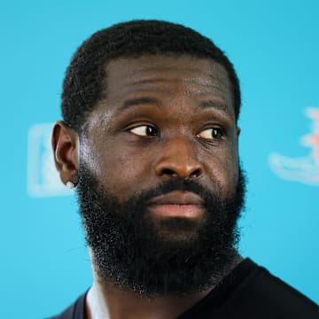 Aug 15, 2024; Miami Gardens, FL, USA; Miami Dolphins offensive tackle Terron Armstead (72) talks to reporters after joint practice with the Washington Commanders at Baptist Health Training Complex. 