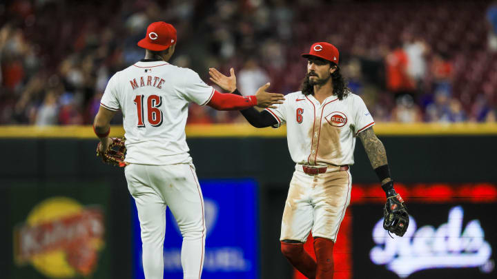 Jul 29, 2024; Cincinnati, Ohio, USA; Cincinnati Reds second baseman Jonathan India (6) high fives third baseman Noelvi Marte (16) after the victory over the Chicago Cubs at Great American Ball Park. Mandatory Credit: Katie Stratman-USA TODAY Sports