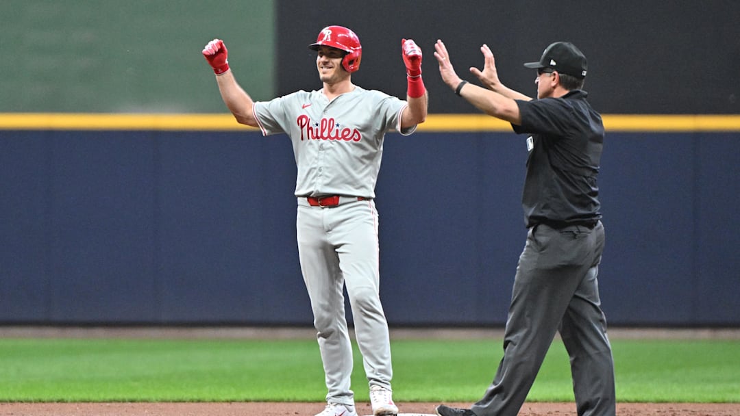 Sep 16, 2024; Milwaukee, Wisconsin, USA; Philadelphia Phillies shortstop Trea Turner (7) celebrates hitting double against the Milwaukee Brewers in the second inning at American Family Field. \