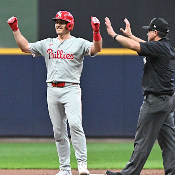 Sep 16, 2024; Milwaukee, Wisconsin, USA; Philadelphia Phillies shortstop Trea Turner (7) celebrates hitting double against the Milwaukee Brewers in the second inning at American Family Field. \