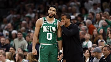 May 25, 2023; Boston, Massachusetts, USA; Boston Celtics forward Jayson Tatum (0) talks with head coach Joe Mazzulla during the first quarter of game five against the Miami Heat in the Eastern Conference Finals for the 2023 NBA playoffs at TD Garden. Mandatory Credit: Winslow Townson-Imagn Images