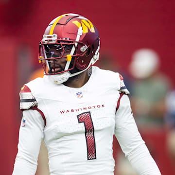 Sep 29, 2024; Glendale, Arizona, USA; Washington Commanders cornerback Noah Igbinoghene (1) against the Arizona Cardinals at State Farm Stadium. Mandatory Credit: Mark J. Rebilas-Imagn Images