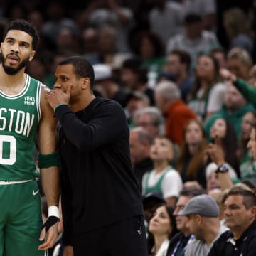 May 25, 2023; Boston, Massachusetts, USA; Boston Celtics forward Jayson Tatum (0) talks with head coach Joe Mazzulla during the first quarter of game five against the Miami Heat in the Eastern Conference Finals for the 2023 NBA playoffs at TD Garden. Mandatory Credit: Winslow Townson-USA TODAY Sports