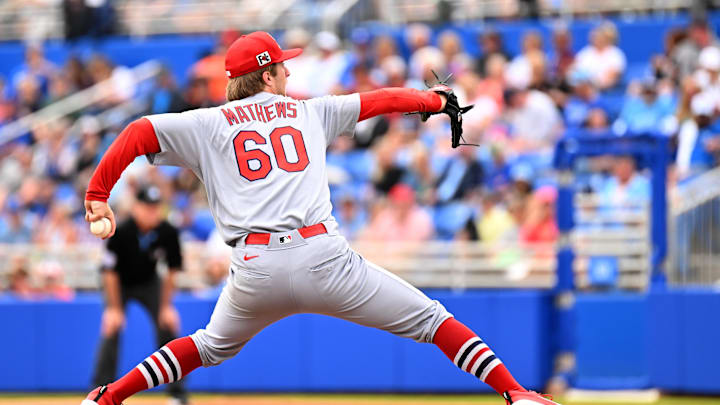 Feb 25, 2025; Dunedin, Florida, USA;  St. Louis Cardinals starting pitcher Quinn Mathews (60) throws against the Toronto Blue Jays in the first inning of a spring training game at TD Ballpark. Mandatory Credit: Jonathan Dyer-Imagn Images