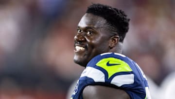 Sep 25, 2025; Glendale, Arizona, USA; Seattle Seahawks center Olu Oluwatimi (55) against the Arizona Cardinals at State Farm Stadium. Mandatory Credit: Mark J. Rebilas-Imagn Images