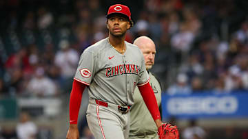 May 7, 2025; Atlanta, Georgia, USA; Cincinnati Reds starting pitcher Hunter Greene (21) leaves the game with an injury against the Atlanta Braves in the fourth inning at Truist Park. Mandatory Credit: Brett Davis-Imagn Images