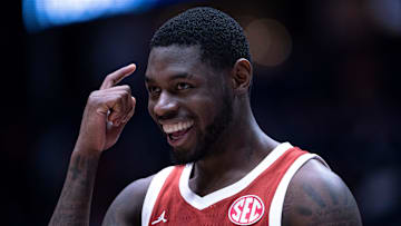 Oklahoma Sooners guard Duke Miles (15) reacts to his late-game play against the Georgia Bulldogs during their first round game of the SEC Men's Basketball Tournament at Bridgestone Arena in Nashville, Tenn., Wednesday, March 12, 2025. Instead of grabbing the ball that was rolling toward their goal, Miles let it go and forced the Georgia Bulldogs player to grab it for a backcourt violation.