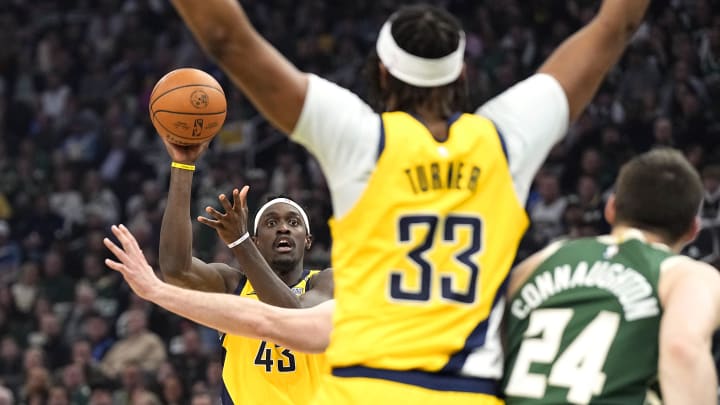 Apr 30, 2024; Milwaukee, Wisconsin, USA;  Indiana Pacers forward Pascal Siakam (43) looks to pass the ball to center Myles Turner (33) during the second quarter against the Milwaukee Bucks during game five of the first round for the 2024 NBA playoffs at Fiserv Forum. Mandatory Credit: Jeff Hanisch-USA TODAY Sports