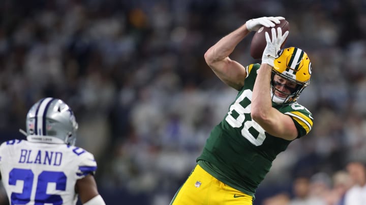 Green Bay Packers tight end Luke Musgrave (88) catches a pass against the Dallas Cowboys during their playoff game.