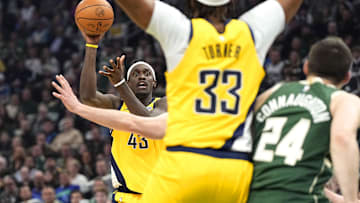 Apr 30, 2024; Milwaukee, Wisconsin, USA;  Indiana Pacers forward Pascal Siakam (43) looks to pass the ball to center Myles Turner (33) during the second quarter against the Milwaukee Bucks during game five of the first round for the 2024 NBA playoffs at Fiserv Forum. Mandatory Credit: Jeff Hanisch-Imagn Images
