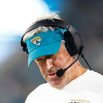 Aug 17, 2024; Jacksonville, Florida, USA; Jacksonville Jaguars head coach Doug Pederson (teal hat) looks on during the second quarter against the Tampa Bay Buccaneers at EverBank Stadium. Mandatory Credit: Douglas DeFelice-Imagn Images