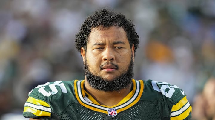Sep 7, 2025; Green Bay, Wisconsin, USA;  Green Bay Packers guard Aaron Banks (65) during the game against the Detroit Lions at Lambeau Field. Mandatory Credit: Jeff Hanisch-Imagn Images