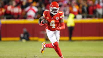 Jan 13, 2024; Kansas City, Missouri, USA; Kansas City Chiefs wide receiver Rashee Rice (4) runs the ball against the Miami Dolphins during the second half of the 2024 AFC wild card game at GEHA Field at Arrowhead Stadium.