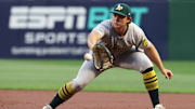 Sep 19, 2025; Pittsburgh, Pennsylvania, USA;  Athletics first baseman Nick Kurtz (16) fields a ground ball against Pittsburgh Pirates center fielder Oneil Cruz (not pictured) during the first inning at PNC Park. Mandatory Credit: Charles LeClaire-Imagn Images