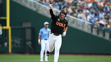 Jun 16, 2024; Omaha, NE, USA; Tennessee Volunteers designated hitter Reese Chapman (13) rounds the bases afer hitting a home run against the North Carolina Tar Heels during the fifth inning at Charles Schwab Field Omaha. Mandatory Credit: Steven Branscombe-USA TODAY Sports