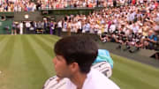 Carlos Alcaraz clapped for Jannik Sinner and looked on as he celebrated with his coaches and family. 