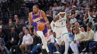 Apr 23, 2024; Minneapolis, Minnesota, USA; Phoenix Suns forward Kevin Durant (35) dribbles against
